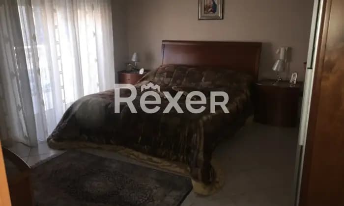 Rexer-Grotte-Appartamento-in-ottime-condizioni-con-balconivendo-senza-mobili-CameraDaLetto