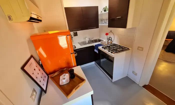 Rexer-Modena-Elegante-Suite-in-antico-borgo-silenzioso-a-min-da-Modena-Cucina