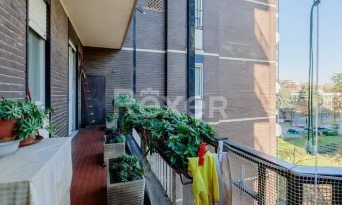 Rexer-Milano-Trilocale-con-soggiorno-doppio-e-cucina-abitabile-mq-Terrazzo
