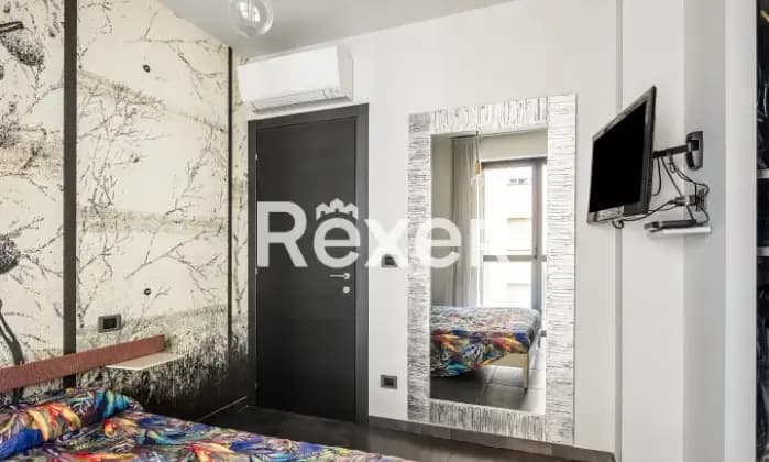 Rexer-Torino-Appartamento-composto-da-cinque-locali-con-terrazzo-CameraDaLetto