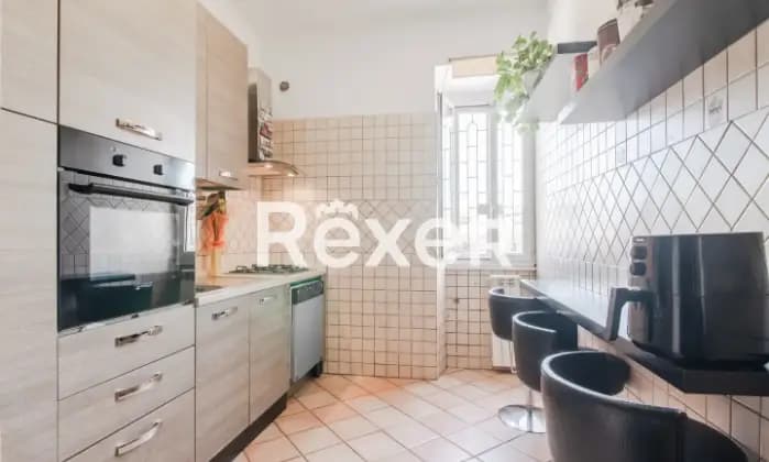 Rexer-Roma-Centocelle-Alessandrino-Bilocale-al-piano-terra-con-giardino-Cucina