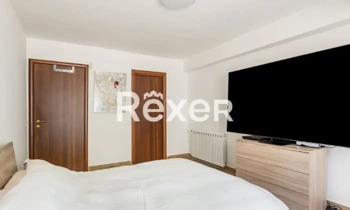 Rexer-Roma-Infernetto-Appartamento-con-ampi-spazi-esterni-CameraDaLetto