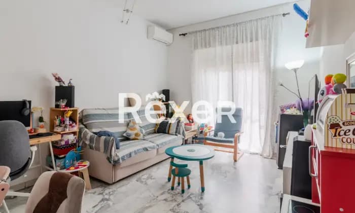 Rexer-Roma-Appartamento-in-Viale-Appio-Claudio-con-box-auto-Salone