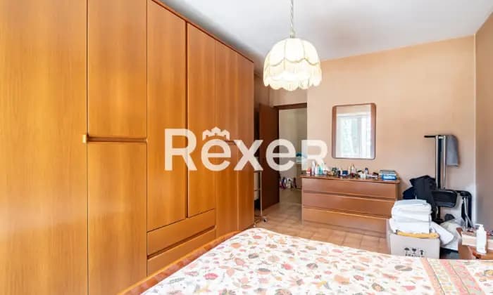 Rexer-Roma-Via-Fiume-Giallo-Appartamento-mq-con-posto-auto-coperto-CameraDaLetto