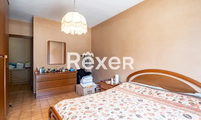 Rexer-Roma-Via-Fiume-Giallo-Appartamento-mq-con-posto-auto-coperto-CameraDaLetto