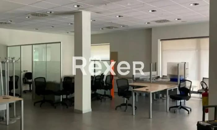 Rexer-Cornaredo-Ex-filiale-bancaria-ai-piani-terra-primo-ed-interrato-con-box-Altro
