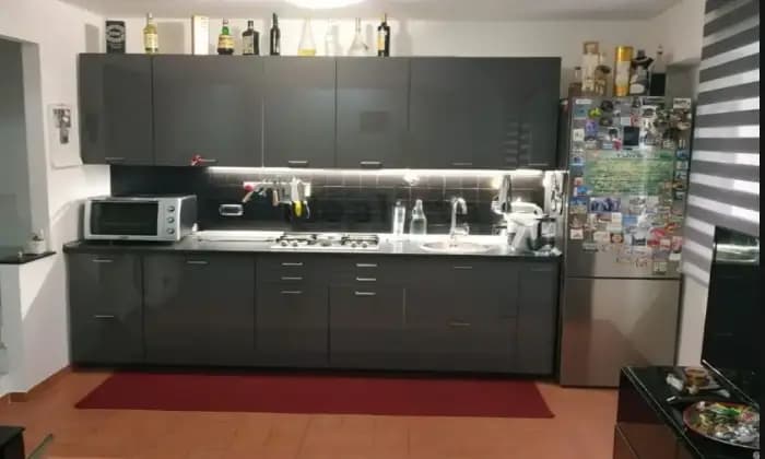 Rexer-Segni-Delizioso-appartamento-indipendente-terracielorustico-con-forno-e-barbecue-legna-Cucina