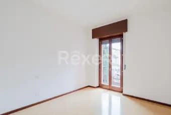 Rexer-Verona-Trilocale-con-cantina-solaio-e-posto-auto-condominiale-CAMERA-DA-LETTO