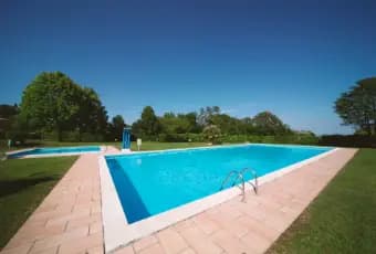 Rexer-Soiano-del-Lago-Appartamento-in-vendita-in-residence-vista-lago-con-piscine-Giardino