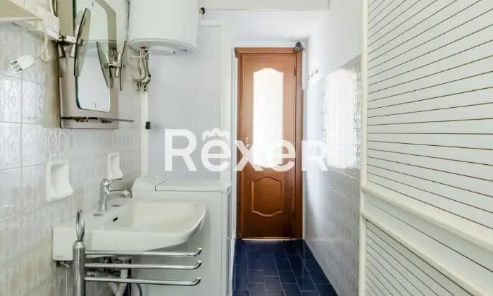 Rexer-Milano-Piazza-Sesia-Appartamento-con-ampio-terrazzo-di-mq-Bagno