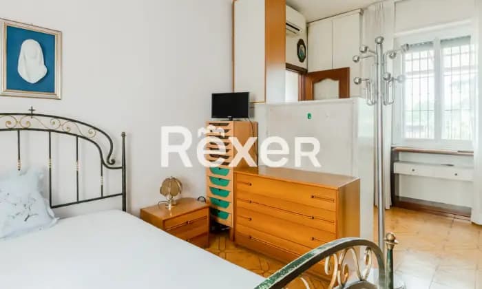 Rexer-Milano-Piazza-Sesia-Appartamento-con-ampio-terrazzo-di-mq-CameraDaLetto