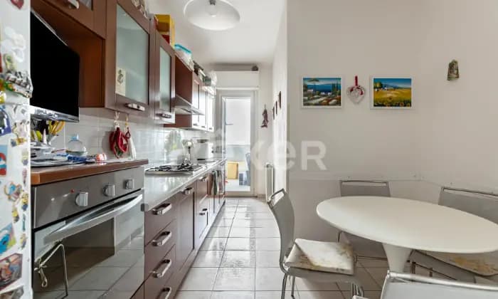 Rexer-Oristano-Affascinante-appartamento-al-sesto-piano-comfort-e-vista-panoramica-CUCINA