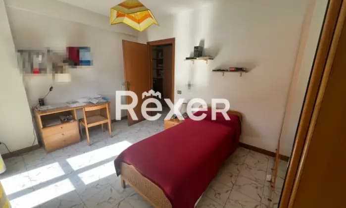 Rexer-Guidonia-Montecelio-Elegante-appartamento-su-due-Livelli-CameraDaLetto