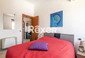 Rexer-Fiumicino-Focene-appartamento-vista-mare-CameraDaLetto