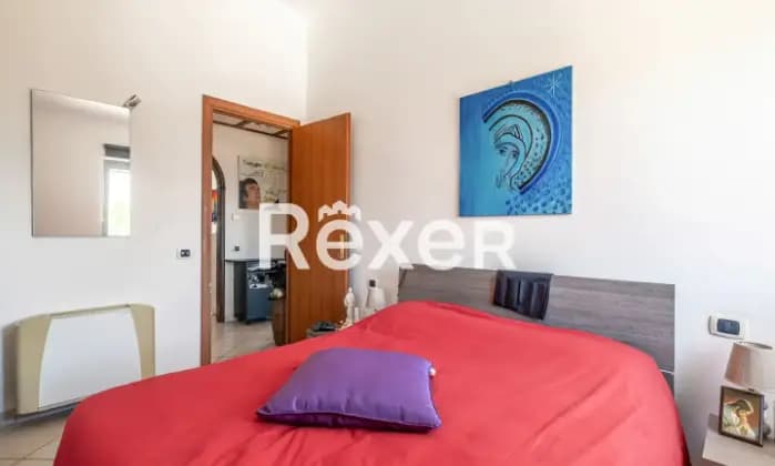 Rexer-Fiumicino-Focene-appartamento-vista-mare-CameraDaLetto