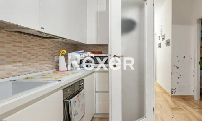 Rexer-Milano-Trilocale-con-cucina-abitabile-al-piano-alto-Cucina