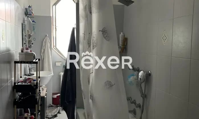 Rexer-Bollate-Bilocale-attualmente-locato-con-cantina-e-box-auto-Bagno