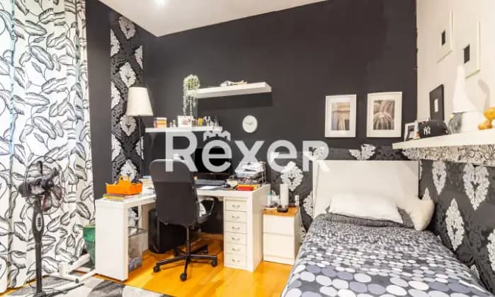 Rexer-Milano-Villa-indipendente-plurifamiliare-composta-da-due-trilocali-magazzino-box-e-giardino-di-mq-CameraDaLetto