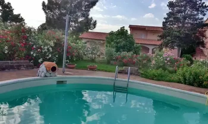Rexer-Scarlino-Casale-con-piscina-Giardino
