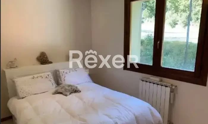 Rexer-Abetone-Appartamento-in-via-Val-di-luce-Abetone-CameraDaLetto