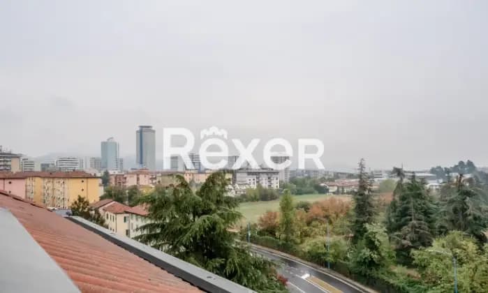 Rexer-Brescia-Attico-con-terrazze-a-tasca-Giardino